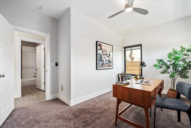 office featuring ceiling fan, carpet, and baseboards