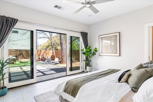 bedroom featuring access to outside and ceiling fan