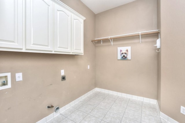 8016 Tahoe Parke Cir, Austin, TX 78726 - laundry area with hookup for an electric dryer, cabinet space, hookup for a washing machine, and baseboards