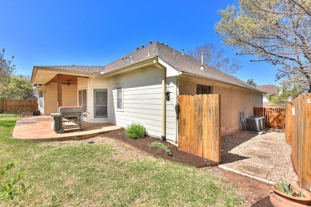 8016 Tahoe Parke Cir, Austin, TX 78726 - back of property featuring a patio, a ceiling fan, cooling unit, and roof with shingles