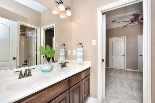 8016 Tahoe Parke Cir, Austin, TX 78726 - full bathroom with double vanity, ceiling fan, and baseboards