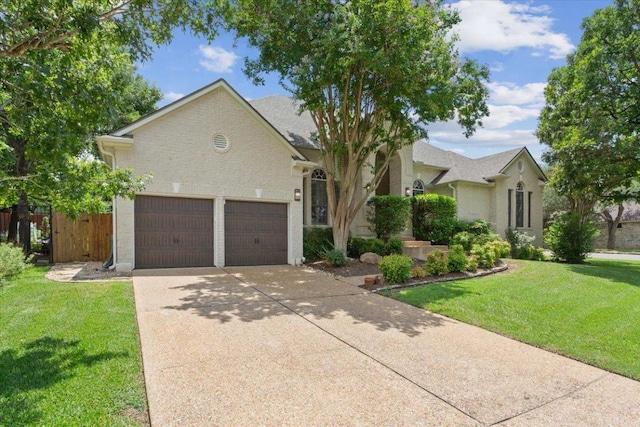 8016 Tahoe Parke Cir, Austin, TX 78726 - view of front of house with driveway and brick siding