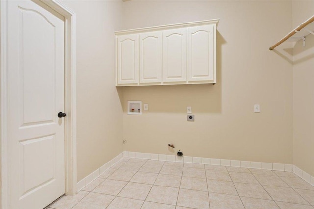 8016 Tahoe Parke Cir, Austin, TX 78726 - washroom featuring hookup for a gas dryer, electric dryer hookup, washer hookup, and light tile patterned floors