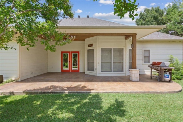8016 Tahoe Parke Cir, Austin, TX 78726 - rear view of property featuring a patio, french doors, a lawn, and roof with shingles