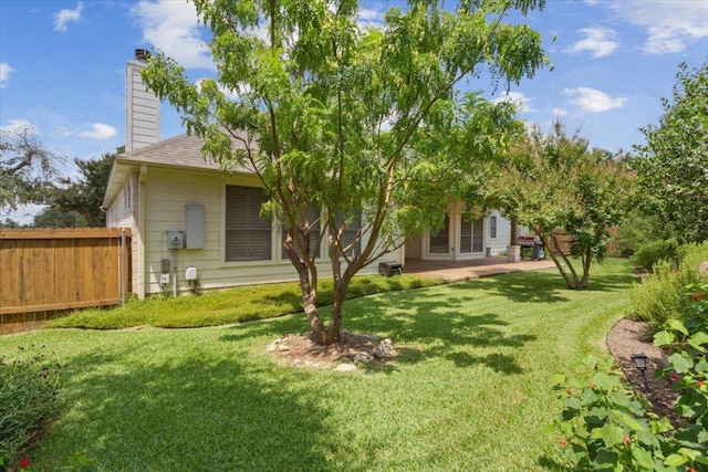 8016 Tahoe Parke Cir, Austin, TX 78726 - rear view of property with a chimney, a shingled roof, and a patio area