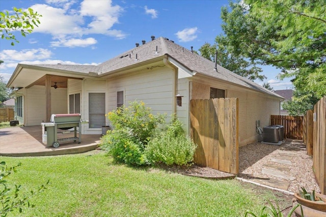 8016 Tahoe Parke Cir, Austin, TX 78726 - back of house with ceiling fan, a patio, a fenced backyard, and roof with shingles
