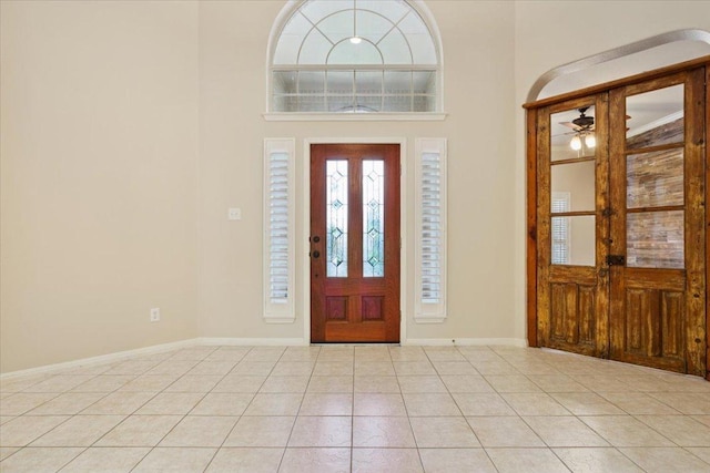 8016 Tahoe Parke Cir, Austin, TX 78726 - entrance foyer featuring a ceiling fan, light tile patterned floors, and a towering ceiling