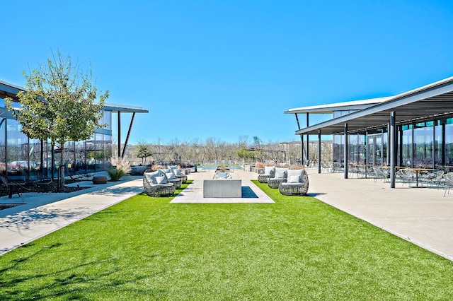 8112 Hubble Walk, Austin, TX 78744 - surrounding community featuring a lawn and a patio area