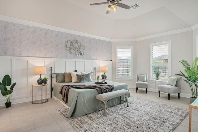 5141 Cornetto Blfs, Round Rock, TX 78665 - bedroom with light tile patterned floors, a decorative wall, a wainscoted wall, and crown molding