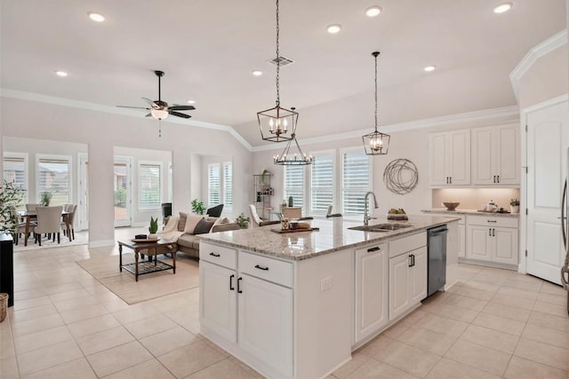 kitchen with light tile patterned floors, a sink, a ceiling fan, and dishwashing machine