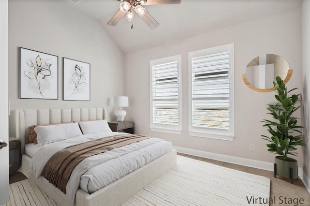 tiled bedroom featuring baseboards, a ceiling fan, and lofted ceiling