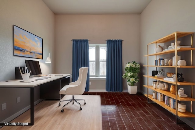 office with wood finished floors and baseboards