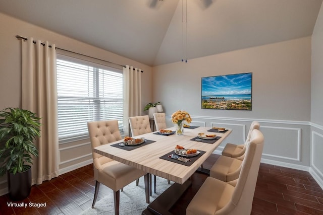5660 Sabbia Dr, Round Rock, TX 78665 - dining area featuring dark wood-type flooring and vaulted ceiling