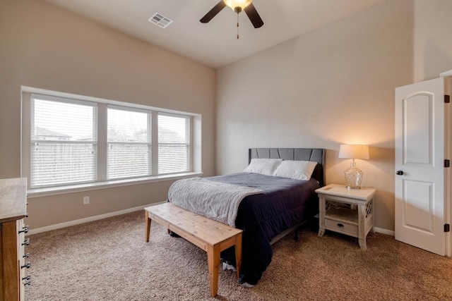 bedroom featuring carpet floors, baseboards, and a ceiling fan