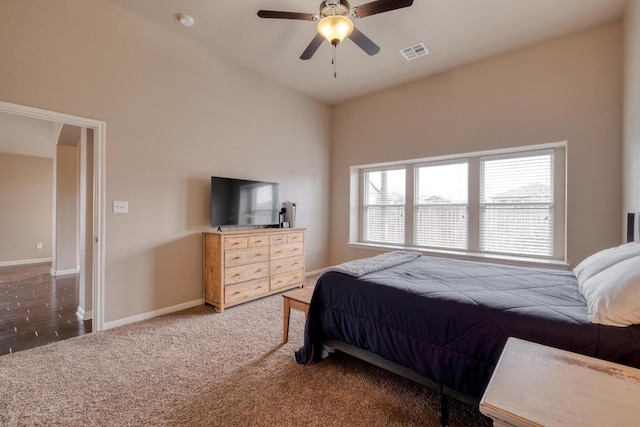 carpeted bedroom with baseboards and a ceiling fan