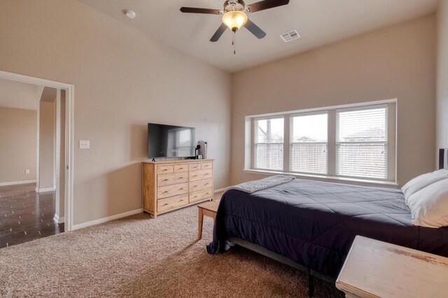 5660 Sabbia Dr, Round Rock, TX 78665 - carpeted bedroom with baseboards and a ceiling fan