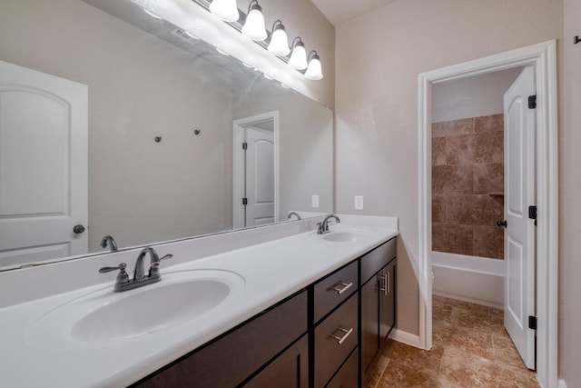 bathroom featuring double vanity