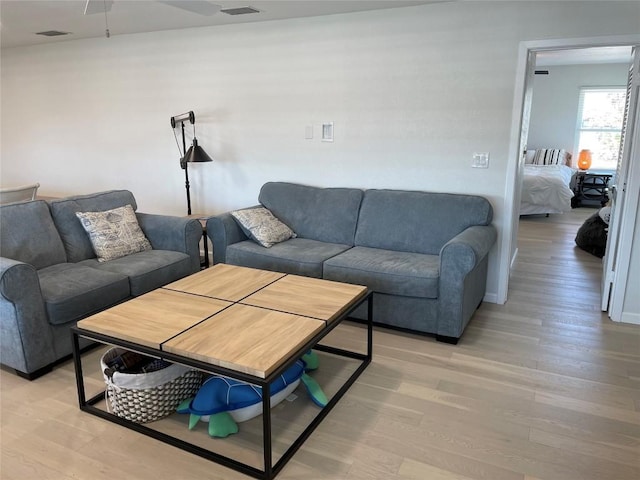 197 Port Saint Claire, Aransas Pass, TX 78336 - living room featuring light wood-style floors