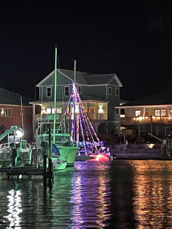 197 Port Saint Claire, Aransas Pass, TX 78336 - dock area featuring a water view and boat lift