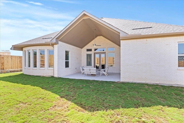 506 Diamondleaf Dr, Buda, TX 78610 - back of property featuring brick siding, a patio area, french doors, a ceiling fan, and a shingled roof