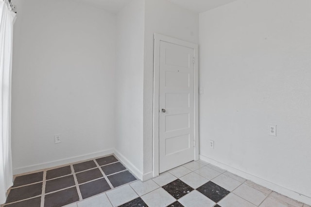 18309 Lake Oaks Dr, Jonestown, TX 78645 - empty room featuring light tile patterned floors and baseboards
