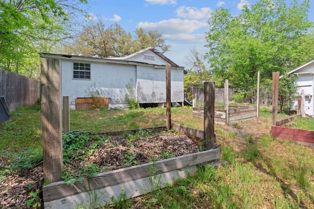 18309 Lake Oaks Dr, Jonestown, TX 78645 - view of yard with a vegetable garden
