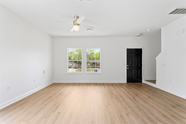 5408 Downs Dr Unit 1, Austin, TX 78721 - unfurnished room featuring light wood finished floors and a ceiling fan