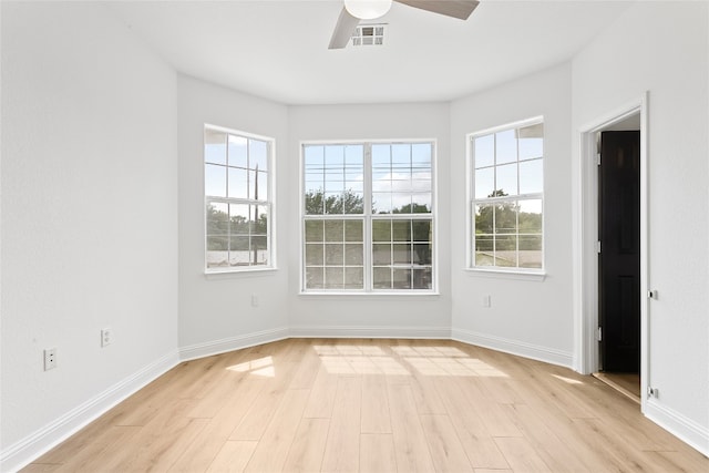 5408 Downs Dr Unit 1, Austin, TX 78721 - spare room featuring a ceiling fan and light wood-style floors