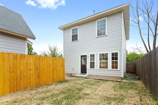 5408 Downs Dr Unit 1, Austin, TX 78721 - back of house with a fenced backyard