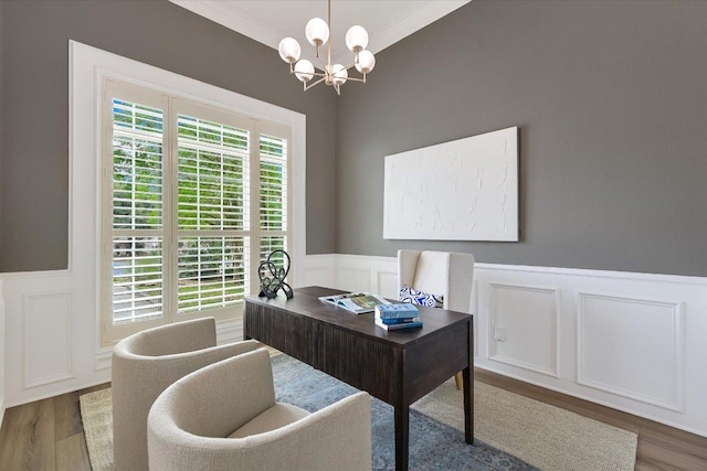 9204 Eddy Cv, Austin, TX 78735 - office space featuring a wainscoted wall, a decorative wall, wood finished floors, a chandelier, and crown molding