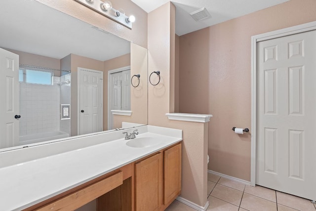 1142 Sundrop Pl, Round Rock, TX 78665 - bathroom featuring vanity, tile patterned floors, and shower / tub combination