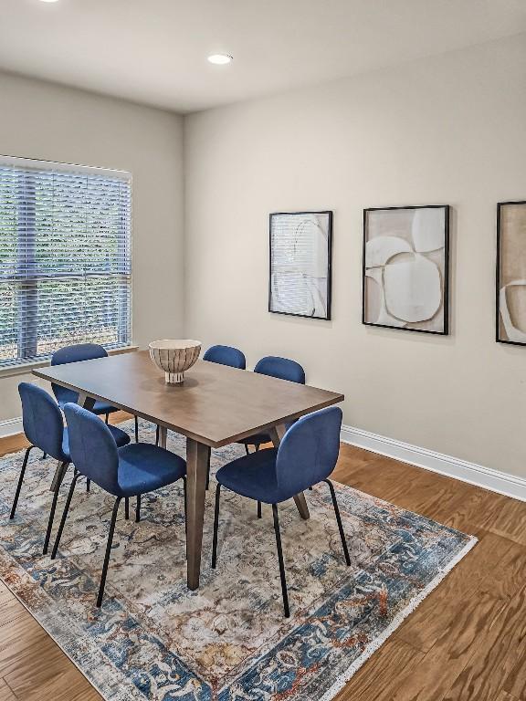 10601 Twisted Elm Dr, Austin, TX 78726 - dining area with wood finished floors and recessed lighting