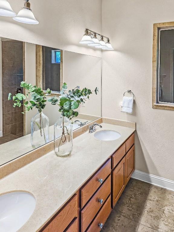 10601 Twisted Elm Dr, Austin, TX 78726 - bathroom featuring double vanity