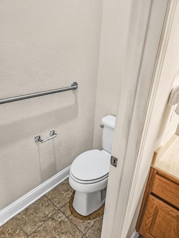 10601 Twisted Elm Dr, Austin, TX 78726 - bathroom featuring tile patterned flooring and toilet