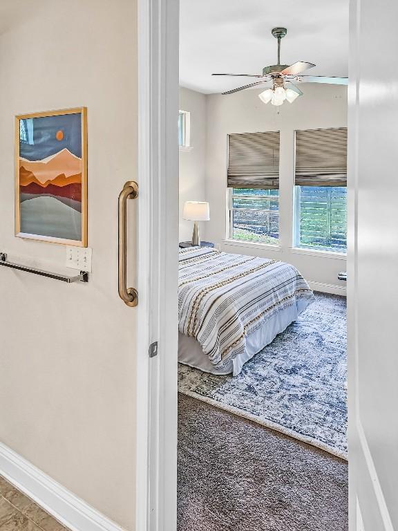 10601 Twisted Elm Dr, Austin, TX 78726 - bedroom featuring baseboards and ceiling fan