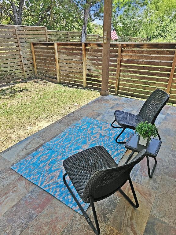 10601 Twisted Elm Dr, Austin, TX 78726 - fenced backyard with a patio
