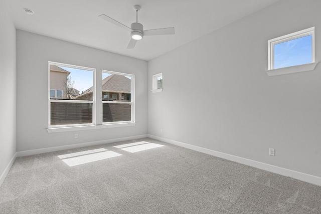 8212 Bouvreuil Dr, Austin, TX 78738 - spare room featuring plenty of natural light, carpet floors, baseboards, and ceiling fan