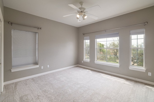 10204 Treasure Island Dr, Austin, TX 78730 - empty room featuring carpet flooring, plenty of natural light, and a ceiling fan