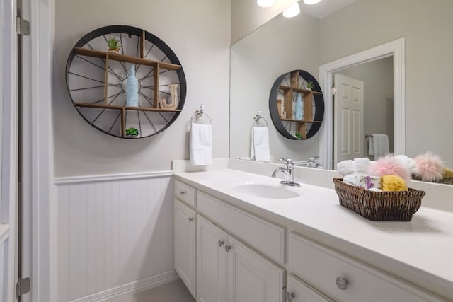 10204 Treasure Island Dr, Austin, TX 78730 - bathroom with vanity and a wainscoted wall