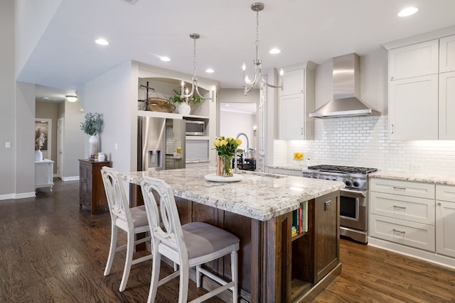 10204 Treasure Island Dr, Austin, TX 78730 - kitchen with stainless steel appliances, wall chimney range hood, open shelves, a kitchen island with sink, and white cabinets