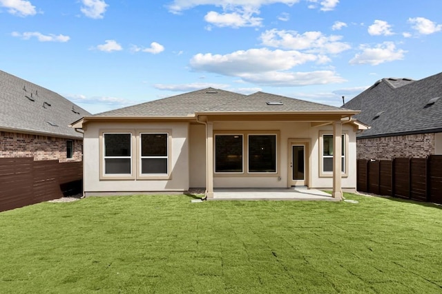 8408 Bouvreuil Dr, Austin, TX 78738 - back of house featuring a patio area, stucco siding, and a shingled roof