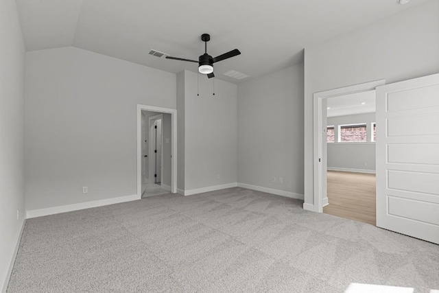 8408 Bouvreuil Dr, Austin, TX 78738 - spare room with a ceiling fan, carpet, baseboards, and lofted ceiling