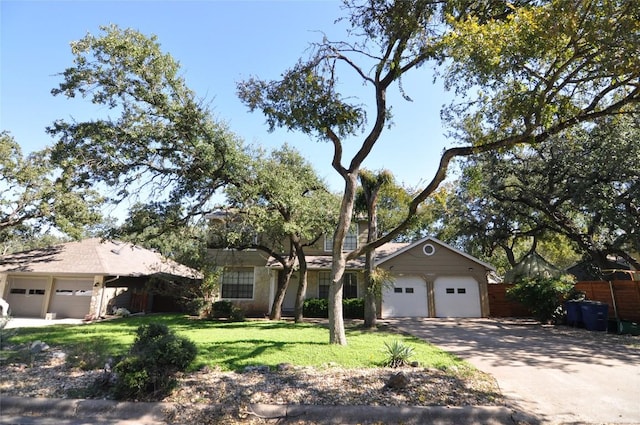 12223 Antoinette Pl, Austin, TX 78727 - view of front facade with a garage and concrete driveway