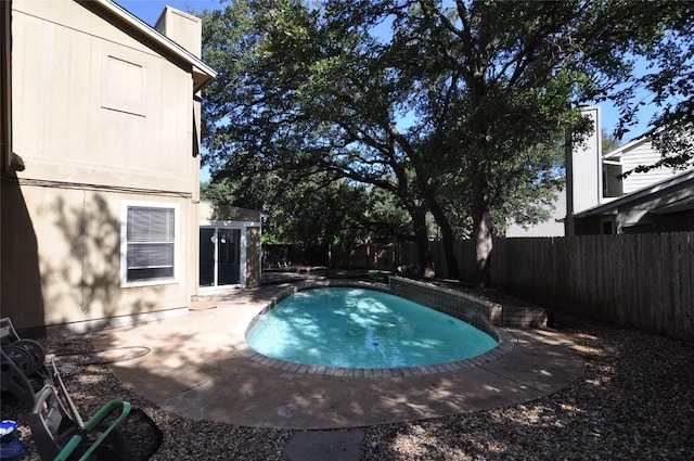 12223 Antoinette Pl, Austin, TX 78727 - view of swimming pool with a fenced backyard, a patio area, and a fenced in pool