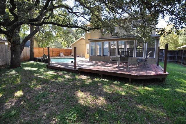 12223 Antoinette Pl, Austin, TX 78727 - back of house with a yard, a fenced in pool, a fenced backyard, and a deck