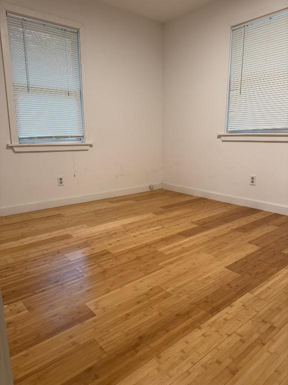 3813 Red Bird Trl, Lago Vista, TX 78645 - unfurnished room with light wood-type flooring