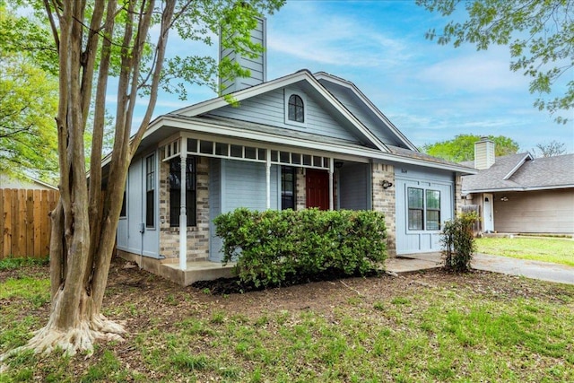 8614 Croydon Loop, Austin, TX 78748 - view of front of home featuring a chimney and stone siding