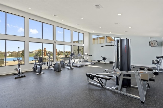 workout area featuring recessed lighting