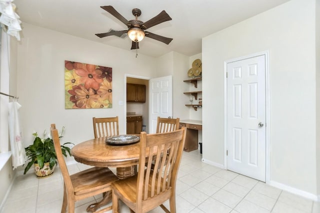 2435 Candle Ridge Trl, Georgetown, TX 78626 - dining room with baseboards, ceiling fan, and light tile patterned floors