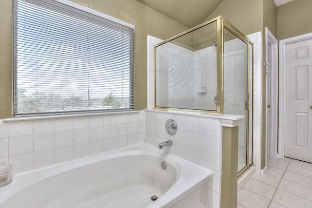 2435 Candle Ridge Trl, Georgetown, TX 78626 - full bathroom featuring a garden tub, tile patterned flooring, and a shower stall